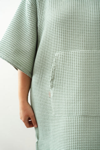 mint adult poncho with sleeves and hood