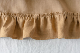 karameļu lina celiņš ar volāniem tuvplānā