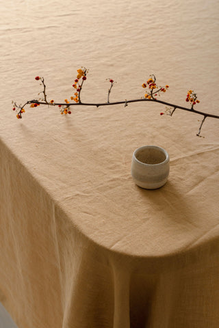 karameļu galdauts tuvplānā